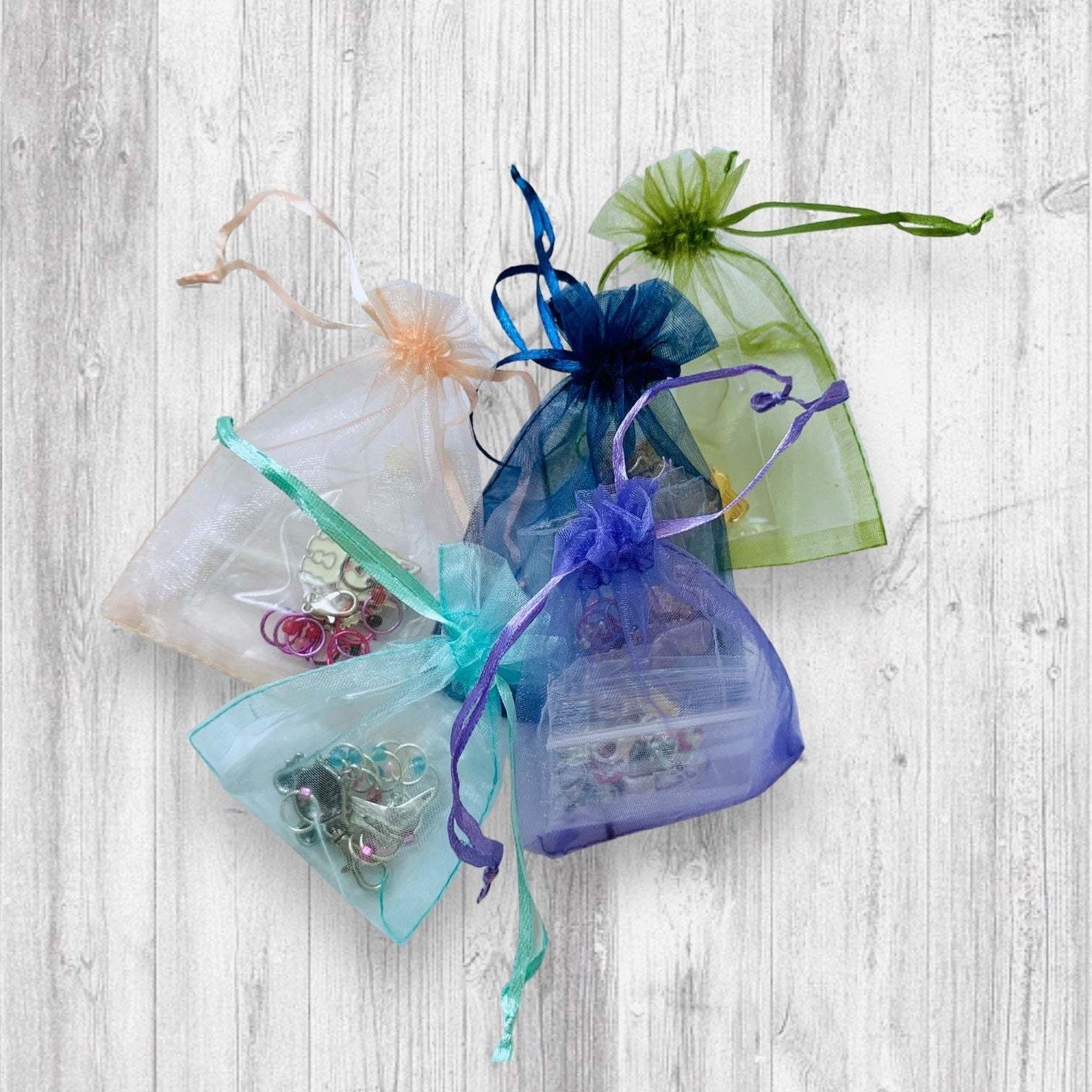 Time for some Mitten Knittin' (White) Progress and Stitch MarkersAdoreKnitTime for some Mitten Knittin' Progress and Stitch Markers are here to help with your accessory knitting!  These stitch markers are great for a knitter or crocheter. Mitten Knittin' (White) Progress