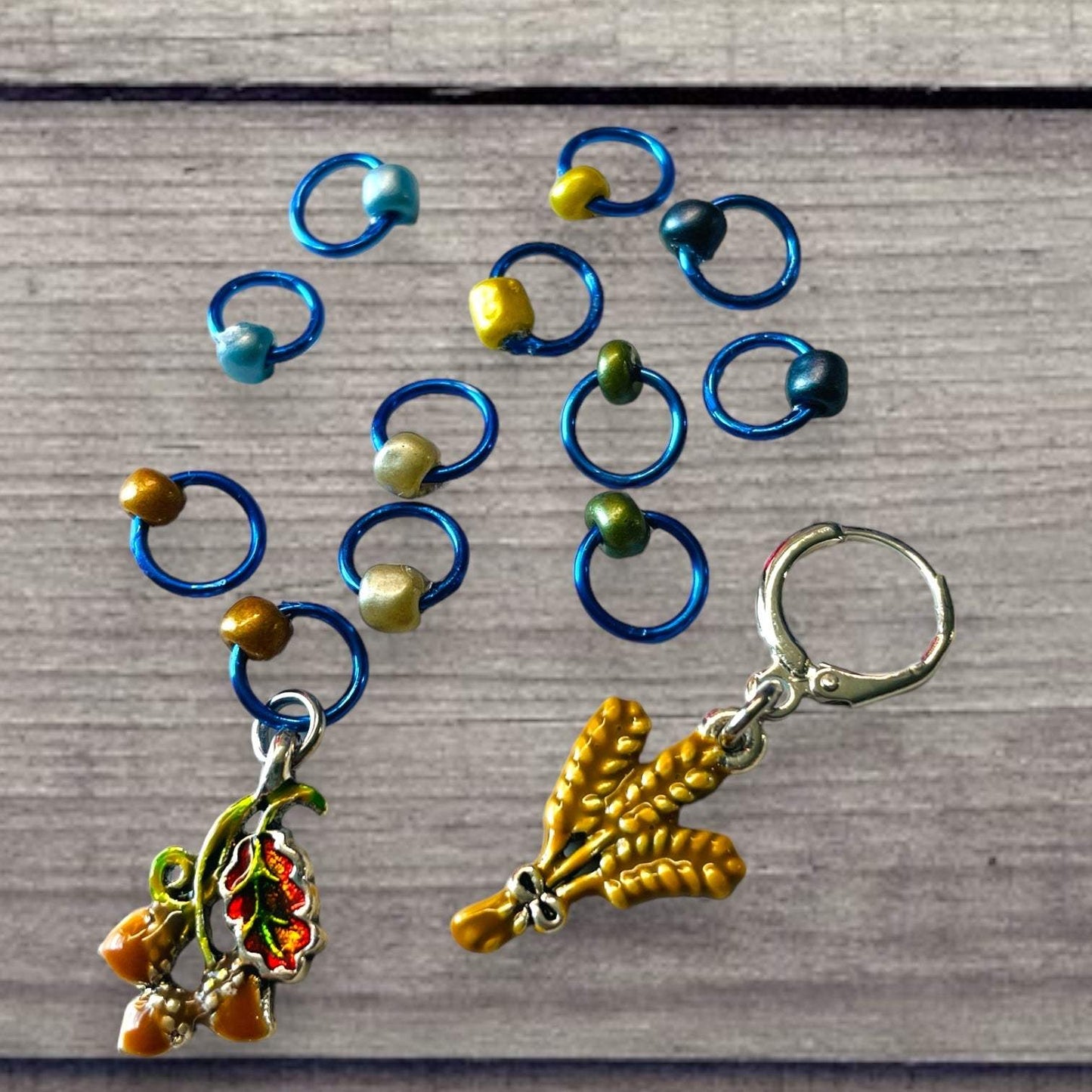 Fall Wheat Harvest Blue Chartreuse Progress and Stitch Marker Set 2023AdoreKnitThe 2023 AdoreKnit Exclusive Pigskin Party Fall Wheat Harvest Blue Progress and Stitch Marker Set!  This year the AdoreKnit Exclusive collection includes Pigskin ParFall Wheat Harvest Blue Chartreuse Progress