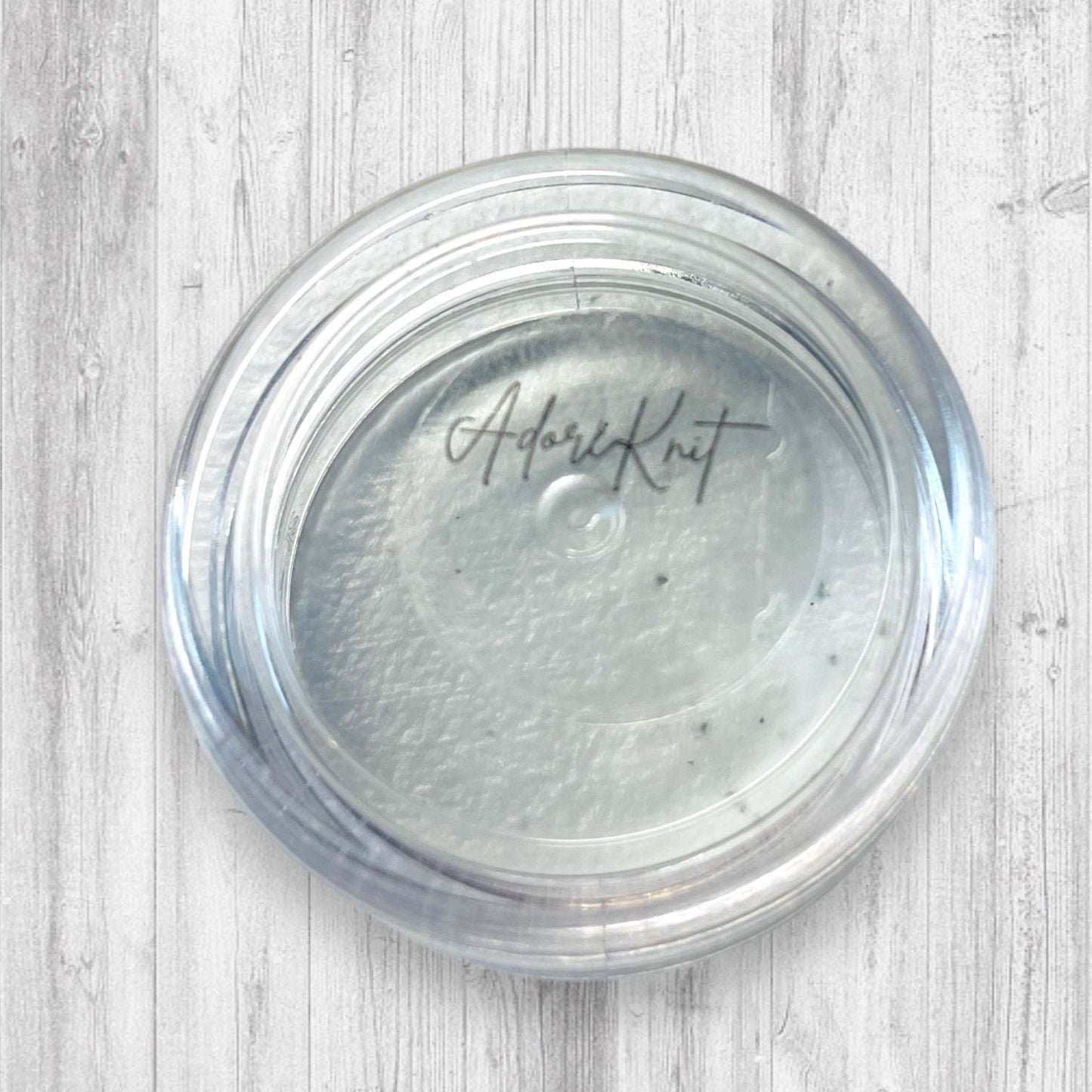 Christmas Sock Knitter's Companion Tiny Stitch Markers with Marker ConAdoreKnitThe Christmas Sock Knitter's Companion!! These tiny stitch markers are perfect for sock knitters. Designed to fit needle sizes: 0-1 US (2-2.5mm). This little set is Companion Tiny Stitch Markers