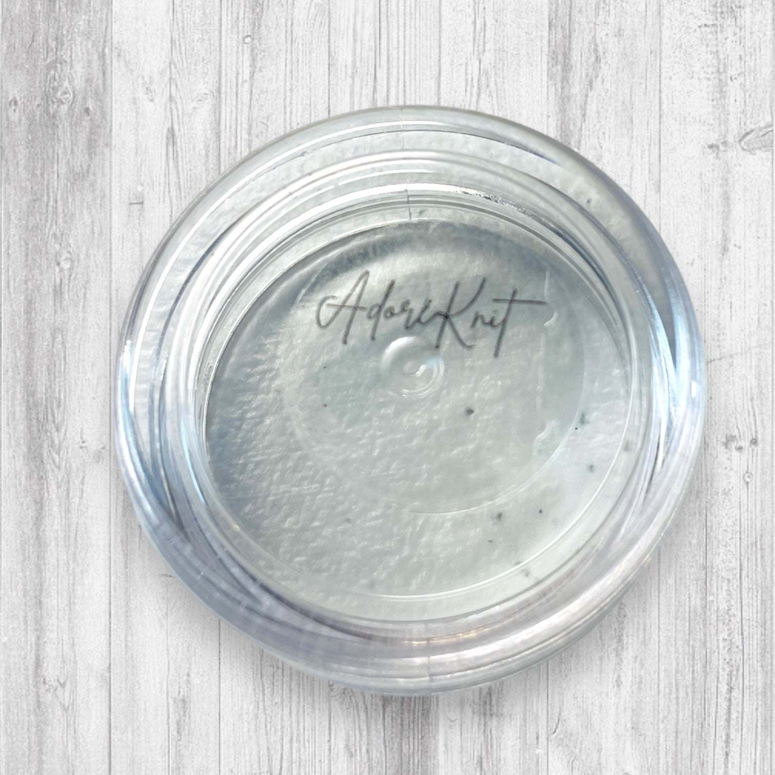 Christmas Sock Knitter's Companion Tiny Stitch Markers with Marker ConAdoreKnitThe Christmas Sock Knitter's Companion!! These tiny stitch markers are perfect for sock knitters. Designed to fit needle sizes: 0-1 US (2-2.5mm). This little set is Companion Tiny Stitch Markers