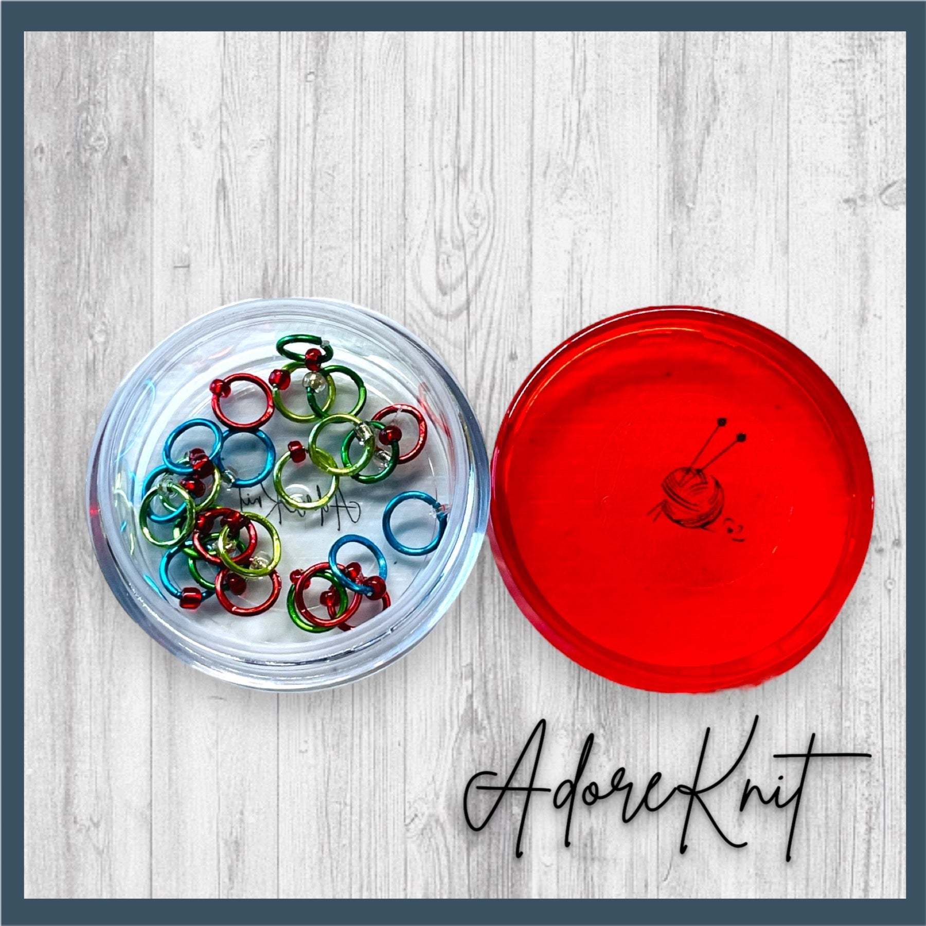 Christmas Sock Knitter's Companion Tiny Stitch Markers with Marker ConAdoreKnitThe Christmas Sock Knitter's Companion!! These tiny stitch markers are perfect for sock knitters. Designed to fit needle sizes: 0-1 US (2-2.5mm). This little set is Companion Tiny Stitch Markers