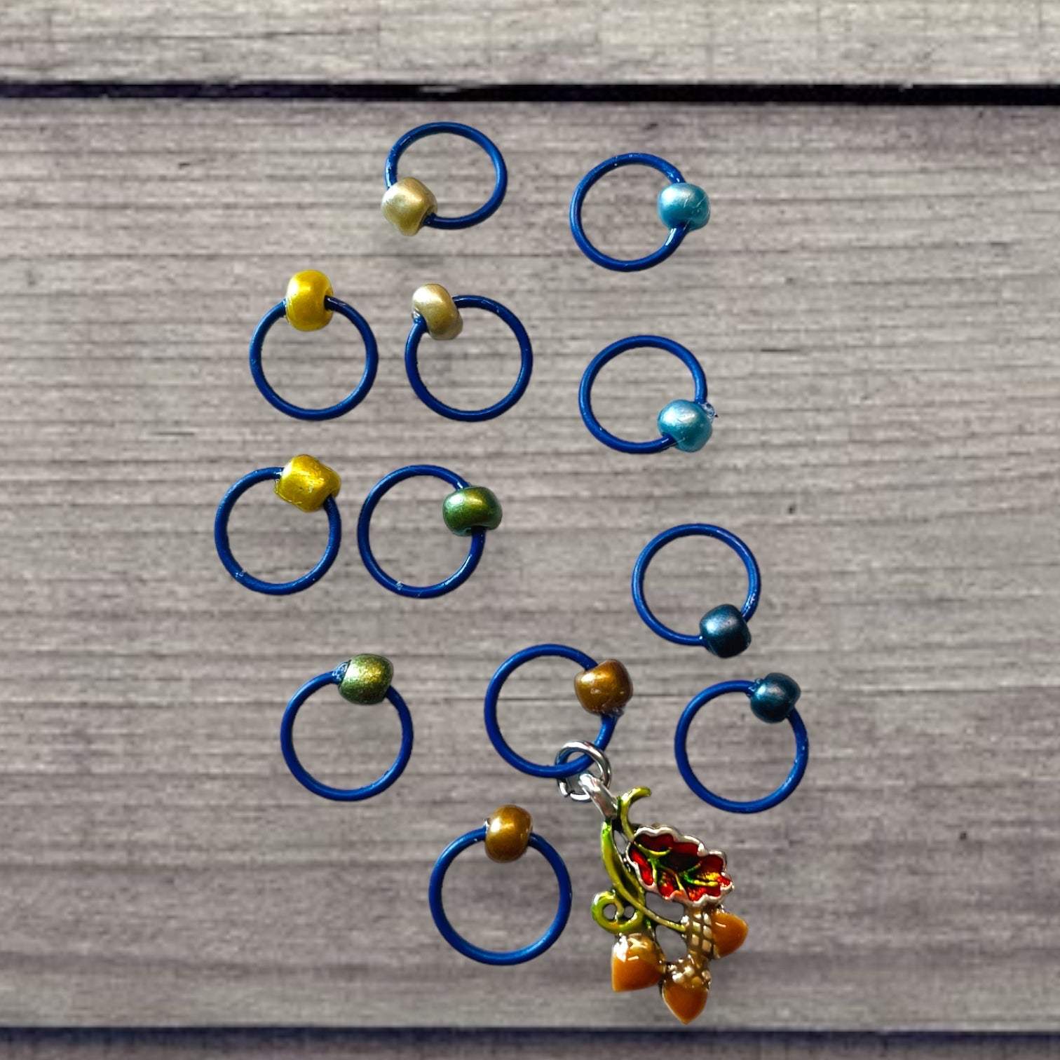 Fall Wheat Harvest Blue Chartreuse Progress and Stitch Marker Set 2023AdoreKnitThe 2023 AdoreKnit Exclusive Pigskin Party Fall Wheat Harvest Blue Progress and Stitch Marker Set!  This year the AdoreKnit Exclusive collection includes Pigskin ParFall Wheat Harvest Blue Chartreuse Progress