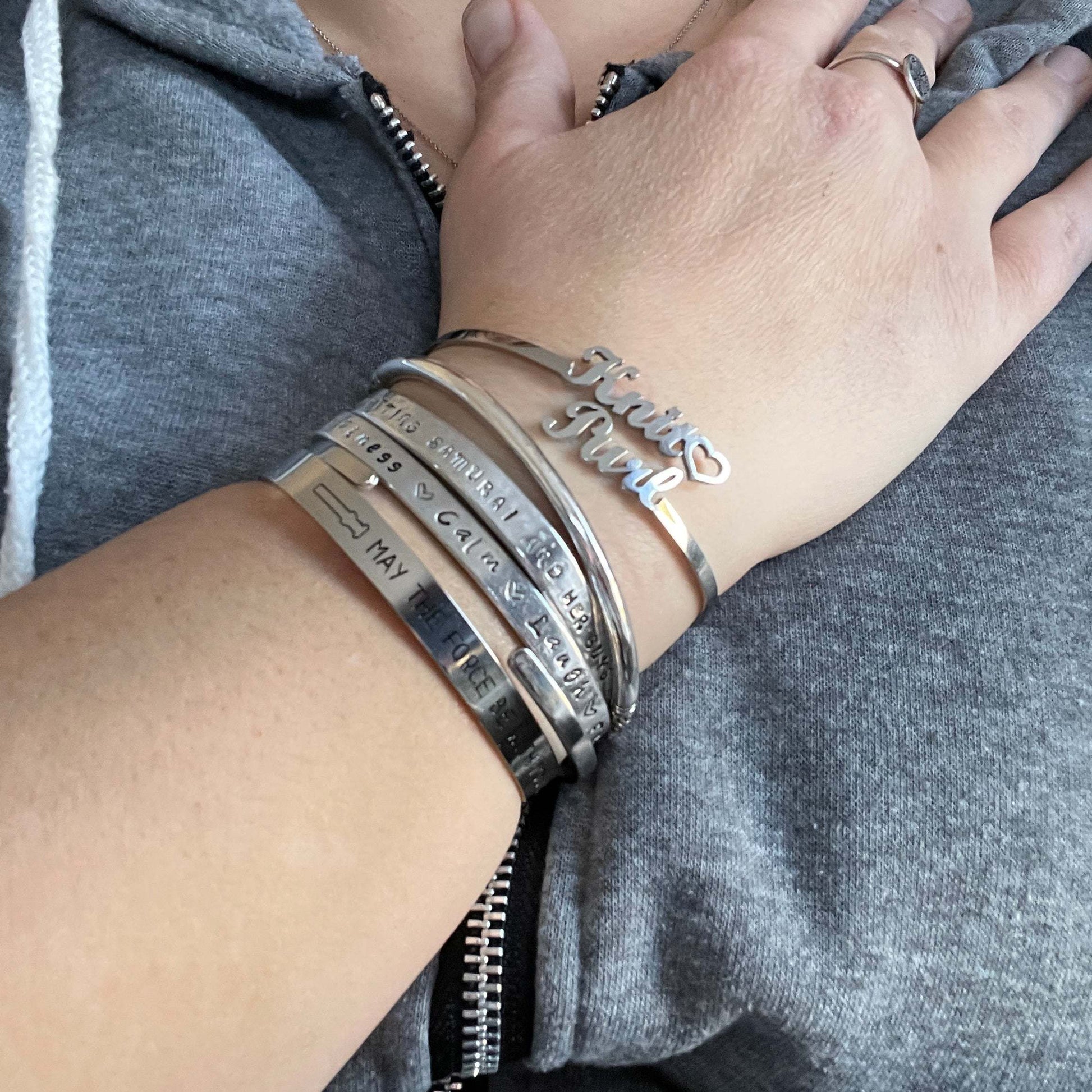 Knit🖤 Purl Bracelet tooAdoreKnitThe Knit 🖤 Purl Bracelet designed by Steph, this stainless steel bangle is the perfect way to show your love of knitting.  Measuring 6.25" in circumference the bangKnit🖤 Purl Bracelet