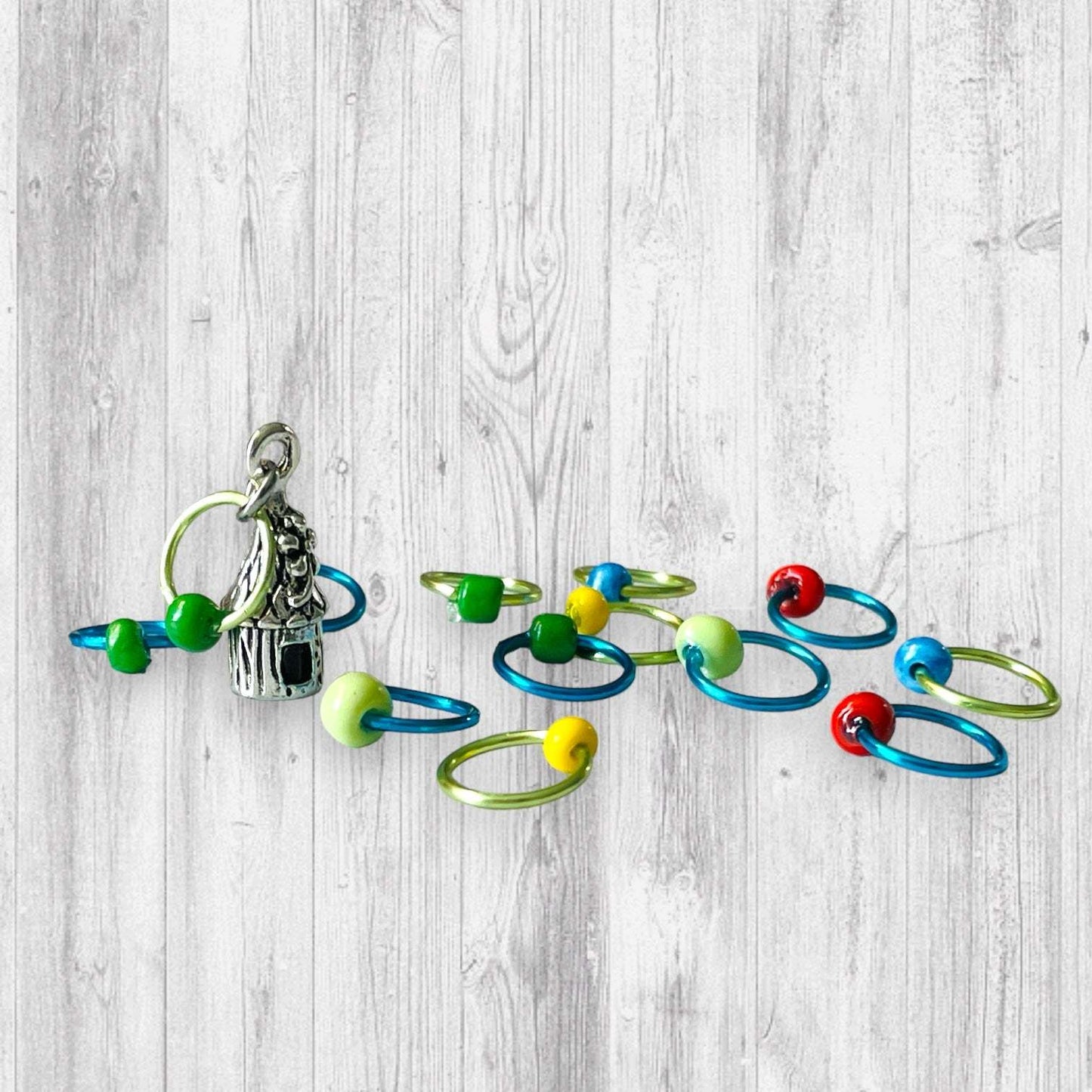 You Don't Gnome Me Progress and Stitch MarkersAdoreKnitYou Don't Gnome Me Progress and Stitch Markers. We couldn't decide if the Gnome house or the daisy went better for this set, so you decide!  Both match perfectly witStitch Markers