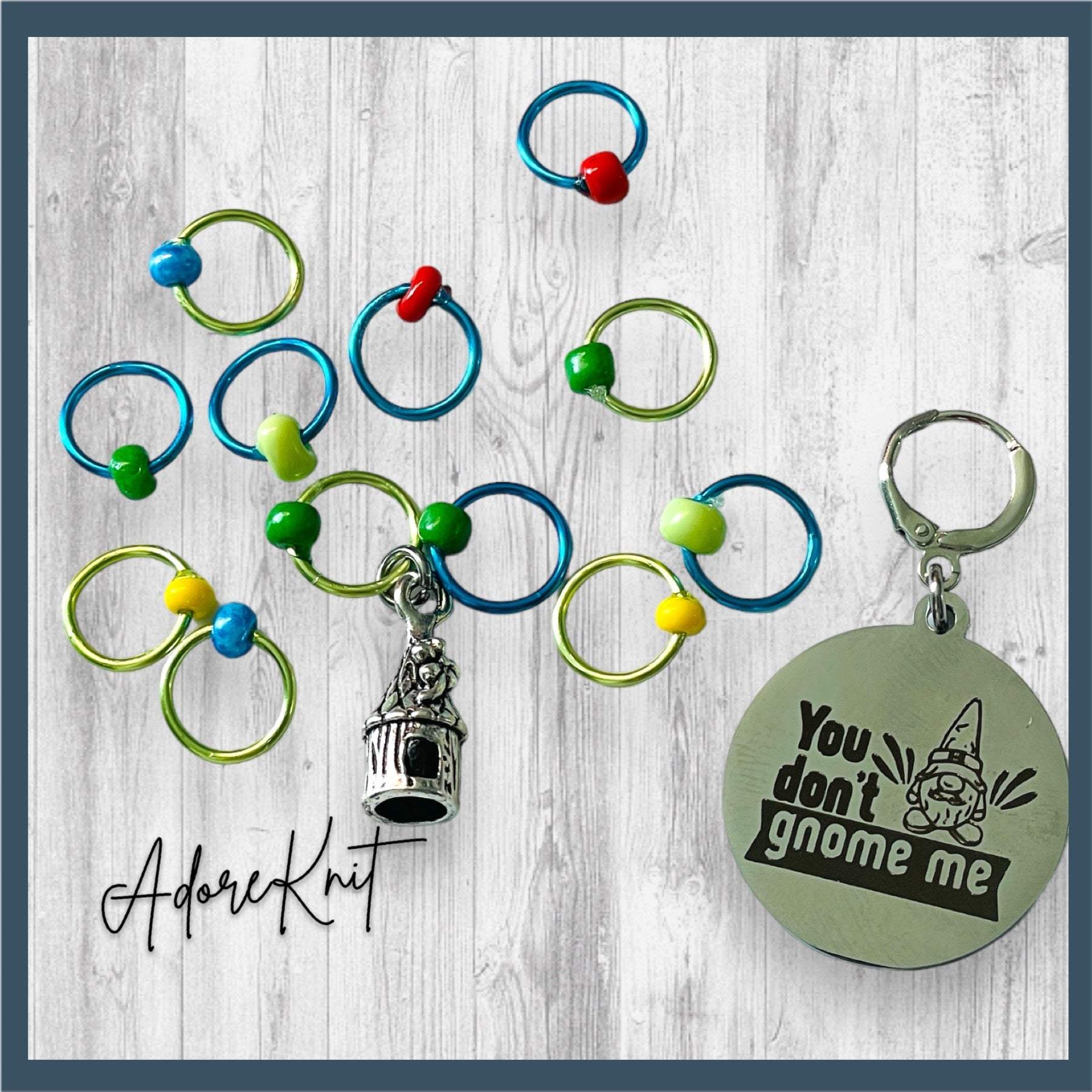 You Don't Gnome Me Progress and Stitch MarkersAdoreKnitYou Don't Gnome Me Progress and Stitch Markers. We couldn't decide if the Gnome house or the daisy went better for this set, so you decide!  Both match perfectly witStitch Markers