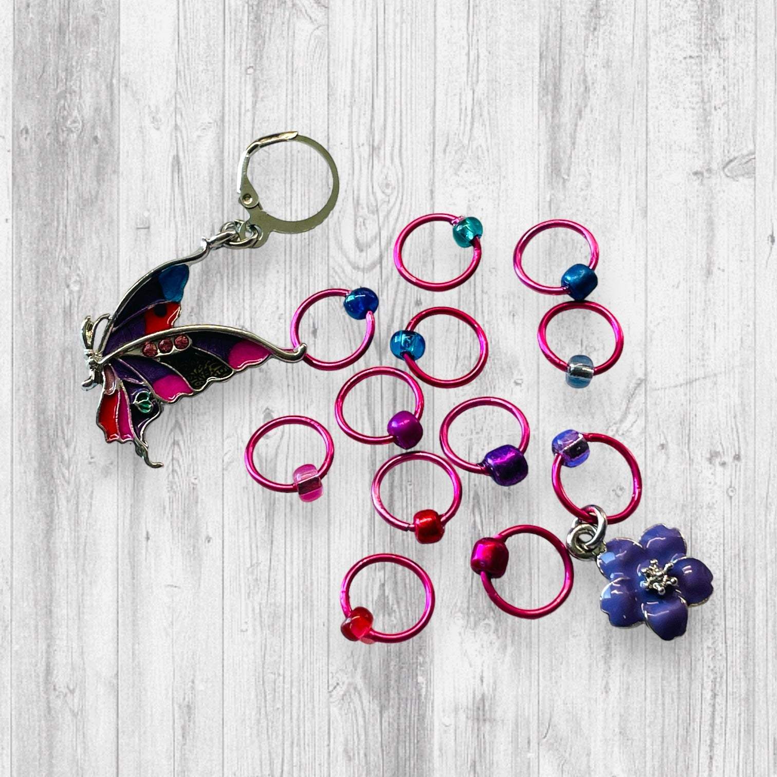 Float Like A Butterfly Progress and Stitch MarkersAdoreKnitFloat Like A Butterfly Progress and Stitch Markers.  The famous Muhammad Ali quote inspired this set, "Float like a Butterfly, sting like a bee."  It seems last summButterfly Progress