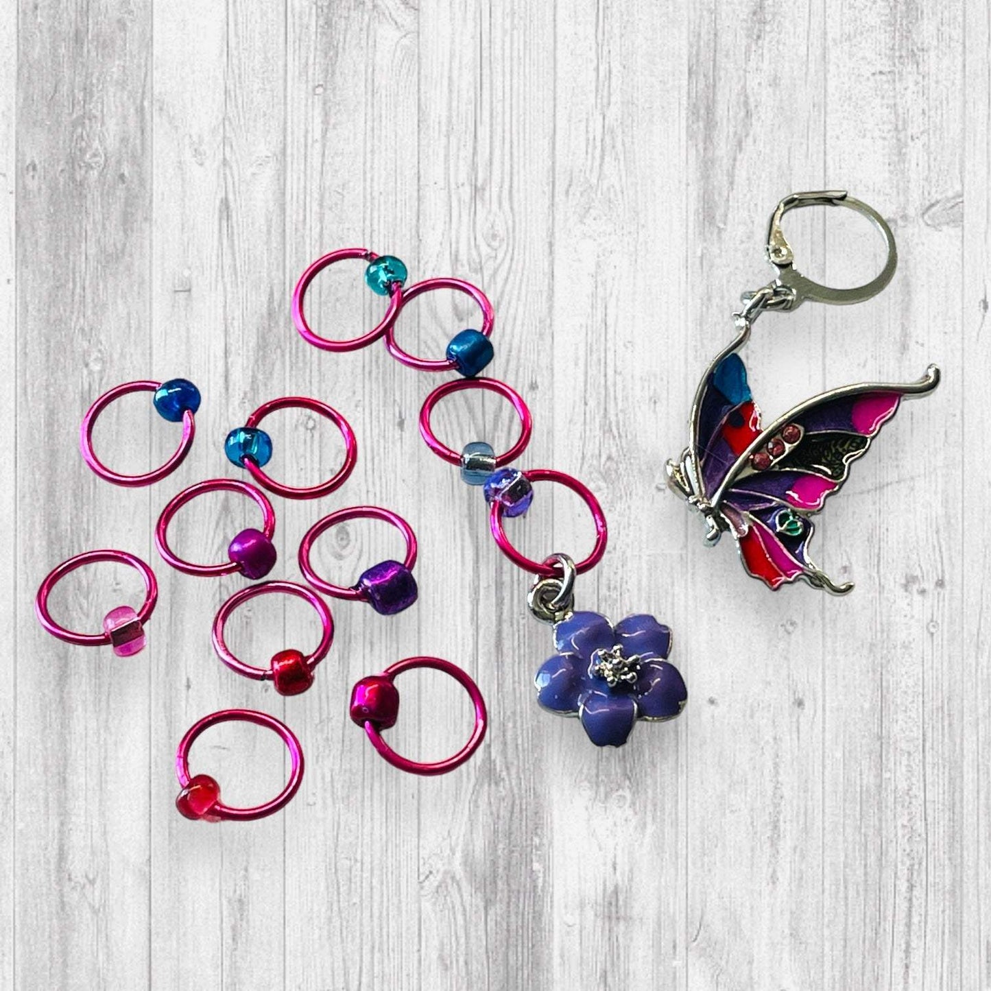 Float Like A Butterfly Progress and Stitch MarkersAdoreKnitFloat Like A Butterfly Progress and Stitch Markers.  The famous Muhammad Ali quote inspired this set, "Float like a Butterfly, sting like a bee."  It seems last summButterfly Progress