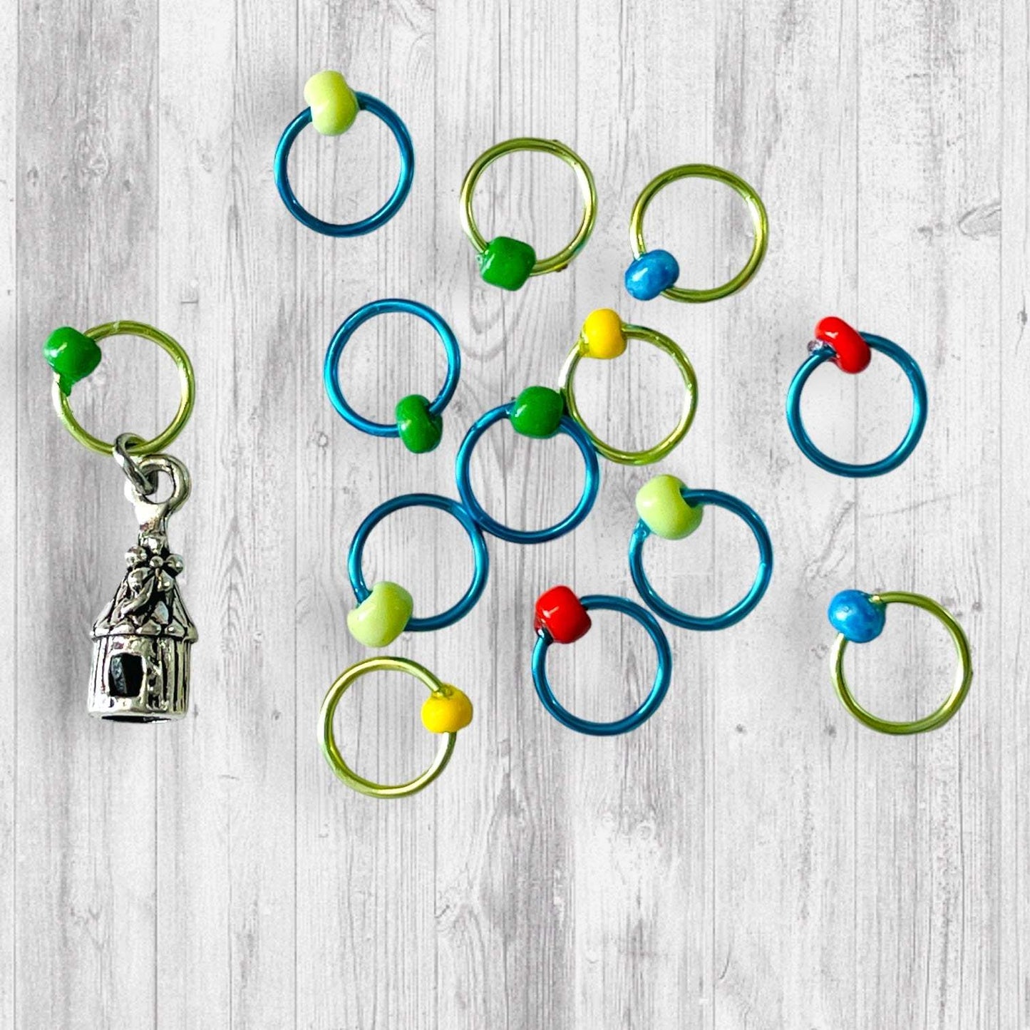 You Don't Gnome Me Progress and Stitch MarkersAdoreKnitYou Don't Gnome Me Progress and Stitch Markers. We couldn't decide if the Gnome house or the daisy went better for this set, so you decide!  Both match perfectly witStitch Markers