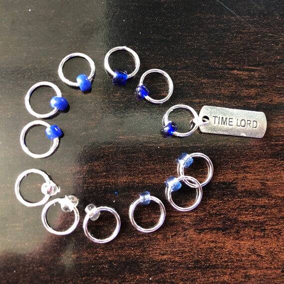 Something Blue Progress and Stitch MarkersAdoreKnitSomething Blue Progress and Stitch Marker Set.  Inspired by the Tardis and the Time Lord in the classic Science-Fiction show Doctor Who.  We all love Doctor Who arouBlue Progress
