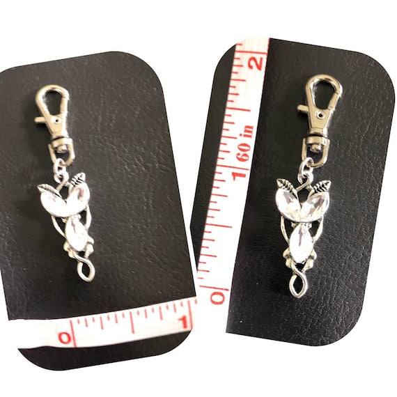 Evenstar inspired Progress and Stitch MarkersAdoreKnitEvenstar inspired Progress and Stitch Markers.   Inspired by the Evenstar worn by Arwen in The Lord of the Rings.  And also inspired by Arwen and Frodo's race on horEvenstar inspired Progress