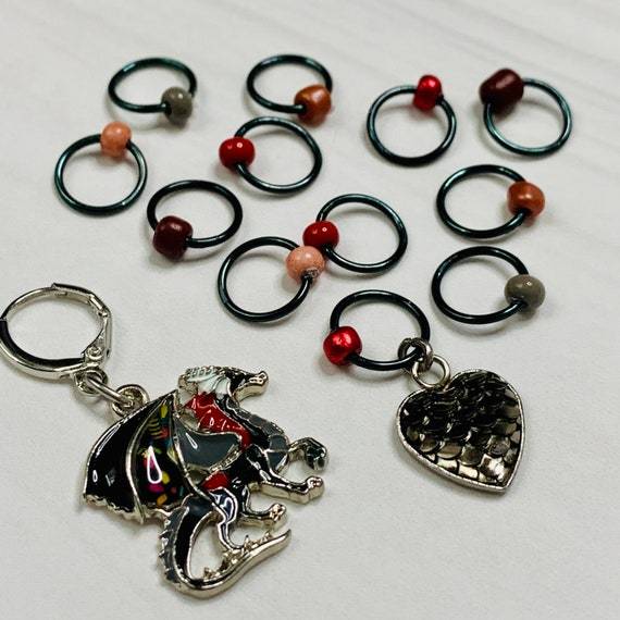 Fire Will Reign Progress and Stitch MarkersAdoreKnit“It has been said that dragon-fire could melt and consume the Rings of Power, but there is not now any dragon left on earth in which the old fire is hot enough; nor Reign Progress