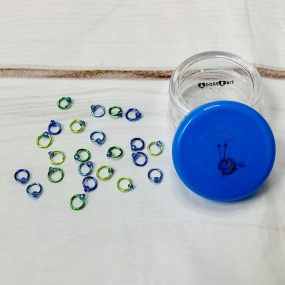 Sock Knitter's Companion Tiny Stitch Markers with Marker Container CorAdoreKnitThe Sock Knitter's Companion!! These tiny stitch markers are perfect for sock knitters. Designed to fit needle sizes: 0-1 US (2-2.5mm). This little set is perfect foCompanion Tiny Stitch Markers