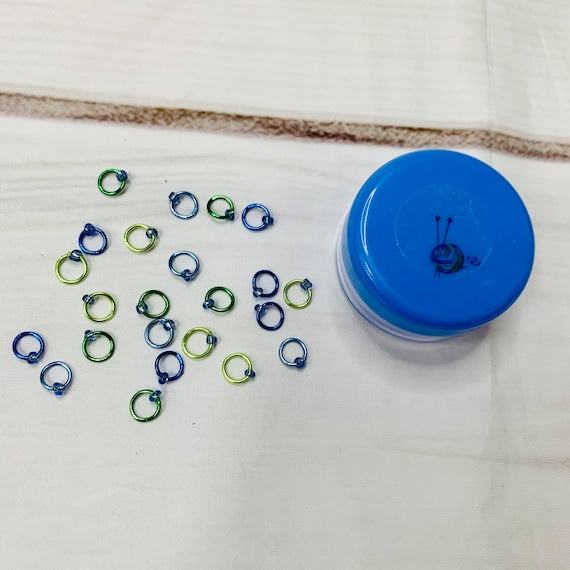 Sock Knitter's Companion Tiny Stitch Markers with Marker Container CorAdoreKnitThe Sock Knitter's Companion!! These tiny stitch markers are perfect for sock knitters. Designed to fit needle sizes: 0-1 US (2-2.5mm). This little set is perfect foCompanion Tiny Stitch Markers