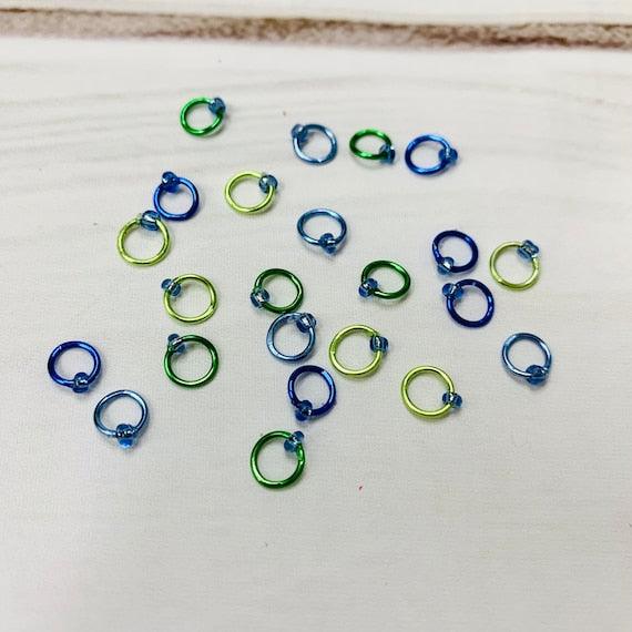 Sock Knitter's Companion Tiny Stitch Markers with Marker Container CorAdoreKnitThe Sock Knitter's Companion!! These tiny stitch markers are perfect for sock knitters. Designed to fit needle sizes: 0-1 US (2-2.5mm). This little set is perfect foCompanion Tiny Stitch Markers