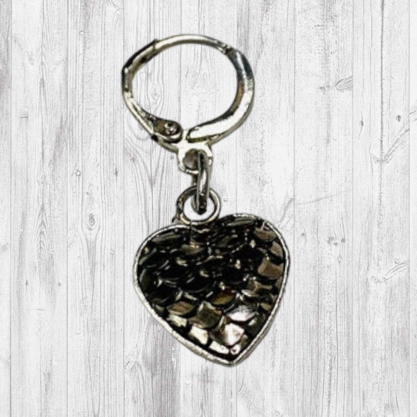 Fire Will Reign Progress and Stitch MarkersAdoreKnit“It has been said that dragon-fire could melt and consume the Rings of Power, but there is not now any dragon left on earth in which the old fire is hot enough; nor Reign Progress