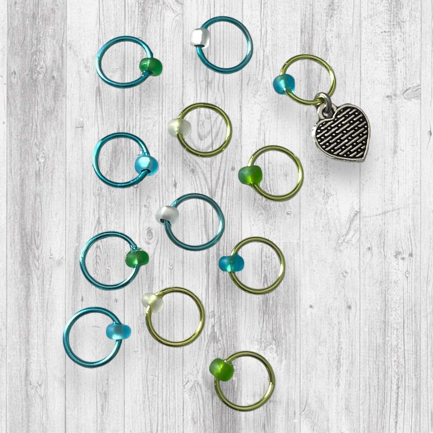 Love Some Knitting & Coffee Progress and Stitch MarkersAdoreKnitLove Some Knitting & Coffee Progress Marker and Stitch Markers.  Who doesn't love a nice warm beverage, their knitting and a new episode of your favorite show?  Knitting & Coffee Progress