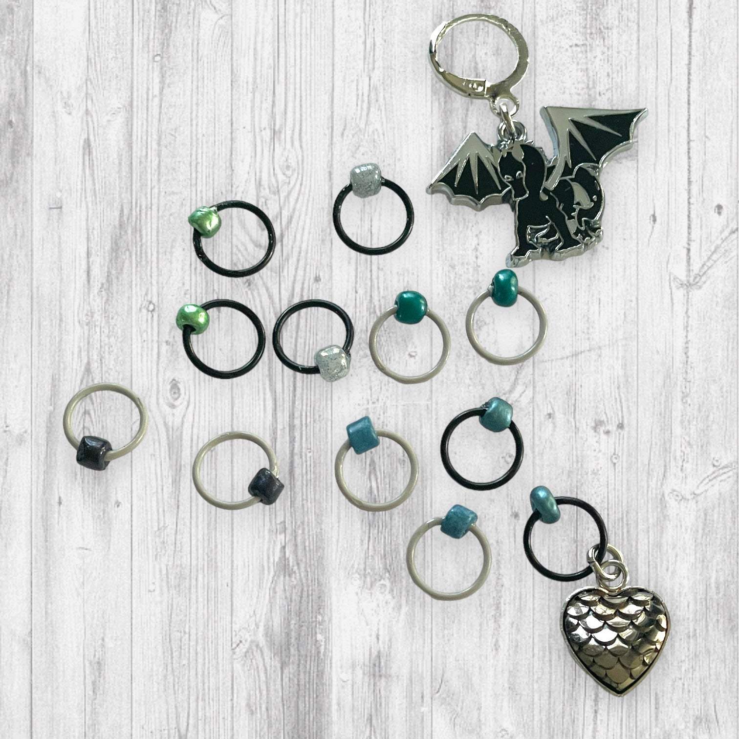 Fire Cannot Kill a Dragon Progress and Stitch MarkersAdoreKnit“He was no dragon.  Fire cannot kill a dragon." ~ Daenerys Targaryen, Game of Thrones,Fire Cannot Kill a Dragon Progress and Stitch Marker Set. Part of our Summer ofDragon Progress