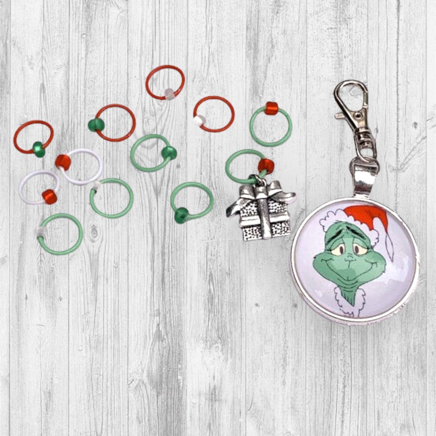 The Stregth of 10 Grinches +2 Progress and Stitch MarkersAdoreKnit"Well, in Whoville they say that the Grinch's small heart grew three sizes that day. And then the true meaning of Christmas came though, and the Grinch found the str10 Grinches +2 Progress