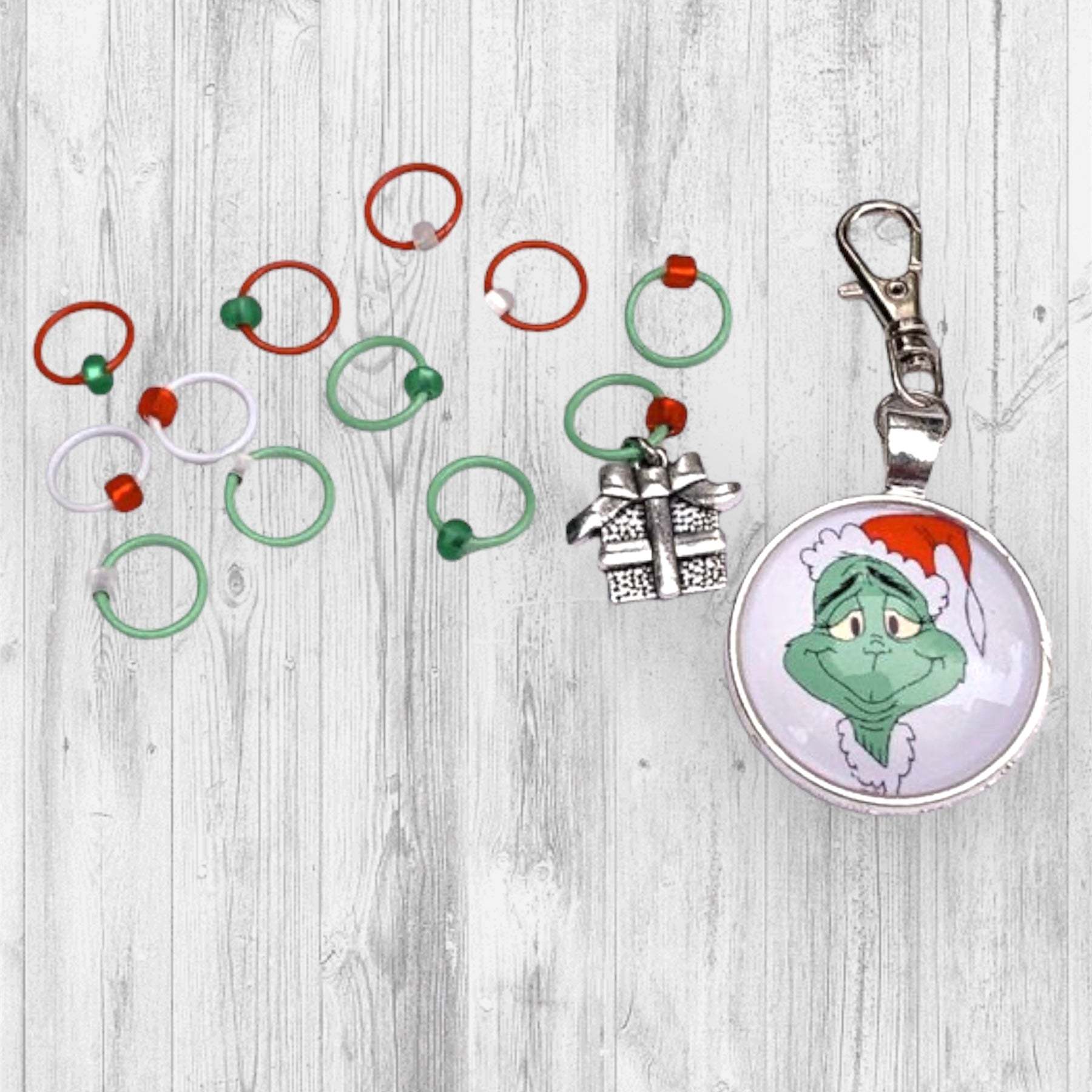 The Stregth of 10 Grinches +2 Progress and Stitch MarkersAdoreKnit"Well, in Whoville they say that the Grinch's small heart grew three sizes that day. And then the true meaning of Christmas came though, and the Grinch found the str10 Grinches +2 Progress