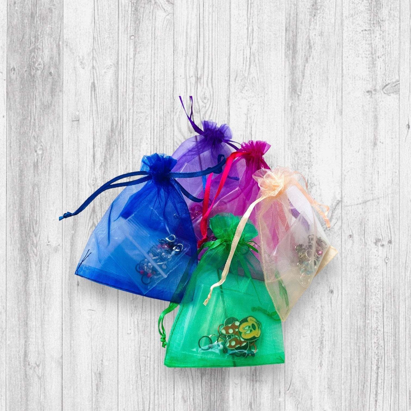 Gnome Place like Home Purple Pansies Progress and Stitch MarkersAdoreKnitAdoreKnit EXCLUSIVE! Gnome Place like Home with Purple Pansies Progress and Stitch Markers. For the longest time I didn't know what girl Gnomes looked like.  This laHome Purple Pansies Progress