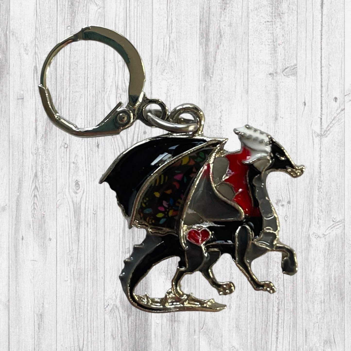 Fire Will Reign Progress and Stitch MarkersAdoreKnit“It has been said that dragon-fire could melt and consume the Rings of Power, but there is not now any dragon left on earth in which the old fire is hot enough; nor Reign Progress