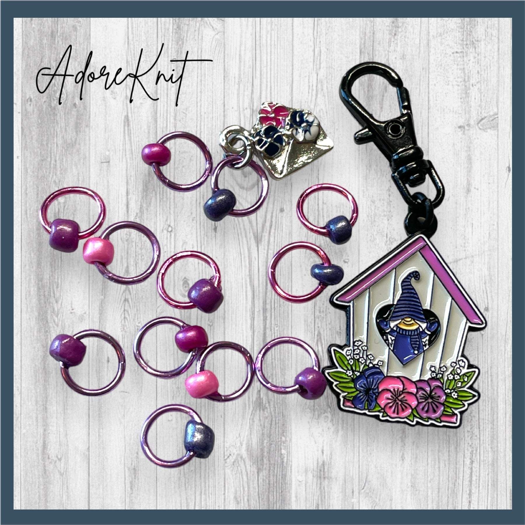 Gnome Place like Home Purple Pansies Progress and Stitch MarkersAdoreKnitAdoreKnit EXCLUSIVE! Gnome Place like Home with Purple Pansies Progress and Stitch Markers. For the longest time I didn't know what girl Gnomes looked like.  This laHome Purple Pansies Progress