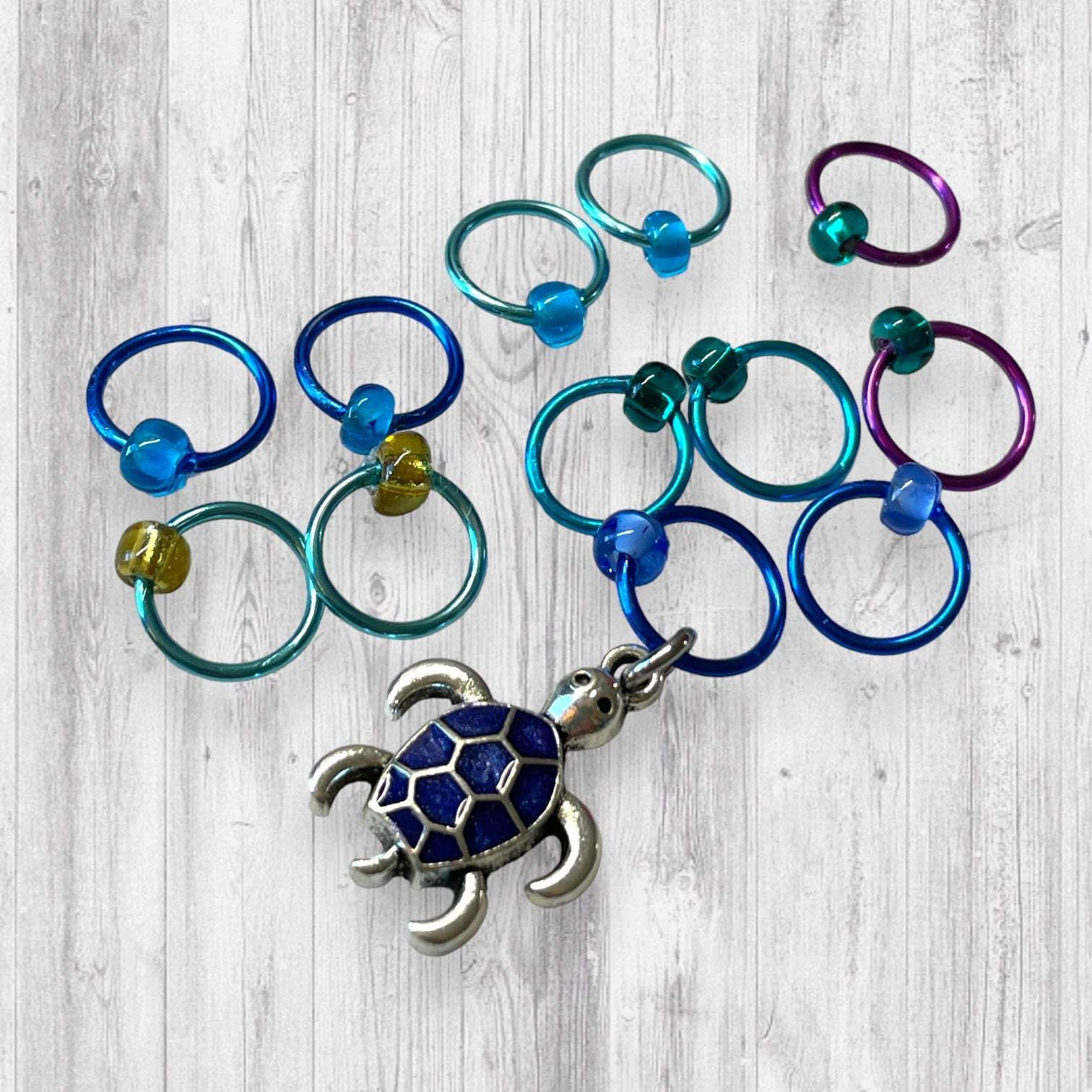 Seahorse and Blue Turtle Progress and Stitch MarkersAdoreKnitSeahorse and Blue Turtle Progress and Stitch Markers. The prefect gift for a knitter! These stitch markers are great for a knitter or crocheter. Include in a swap paBlue Turtle Progress