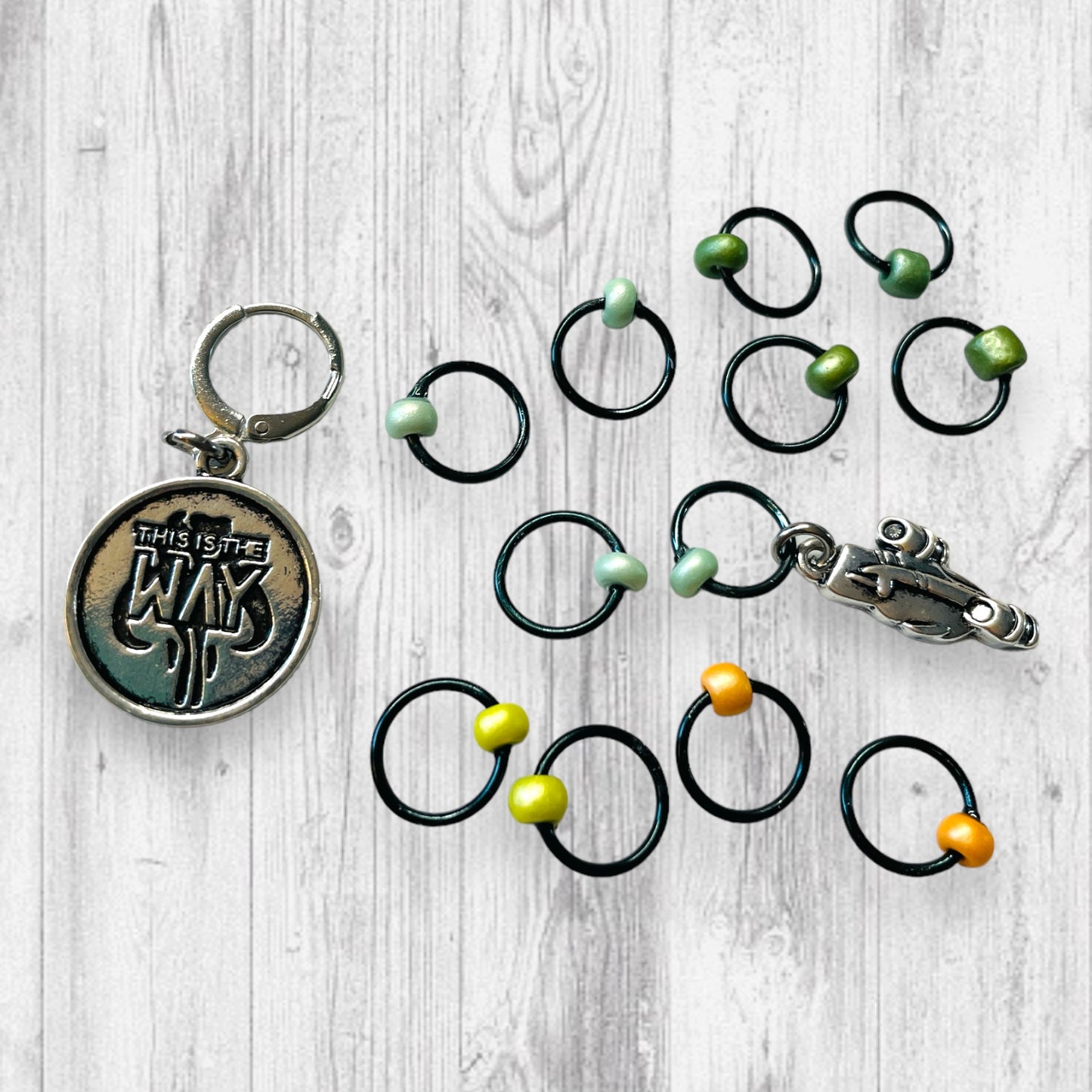 This is the Way Progress and Stitch MarkersAdoreKnitThis Is the Way Progress and Stitch Markers.  Inspired by the often heard phrase in the Madalorian Series.  The prefect gift for a knitter! These stitch markers are Stitch Markers