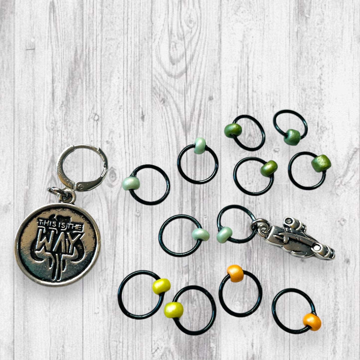 This is the Way Progress and Stitch MarkersAdoreKnitThis Is the Way Progress and Stitch Markers.  Inspired by the often heard phrase in the Madalorian Series.  The prefect gift for a knitter! These stitch markers are Stitch Markers