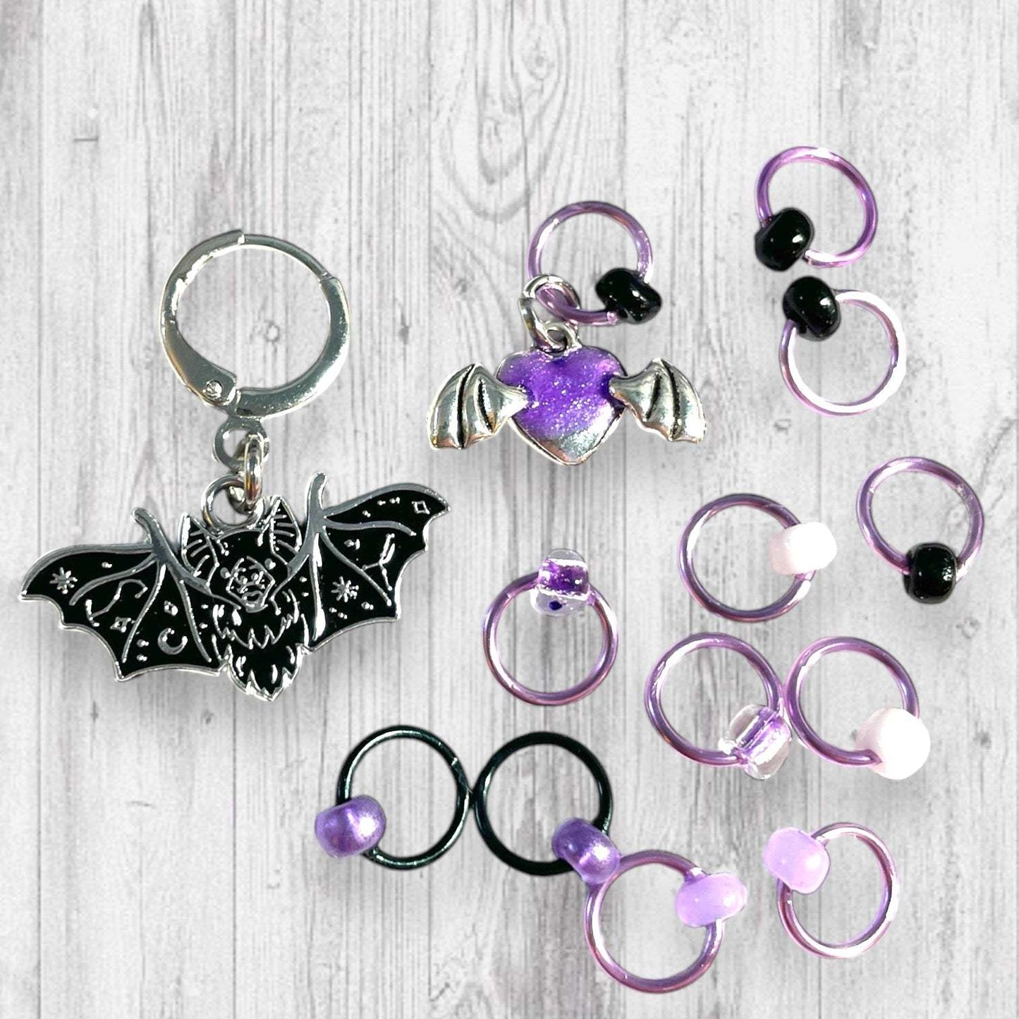 Playful Purple Bats Pass Piles of Peppermint Candy Progress and Stitch Markers