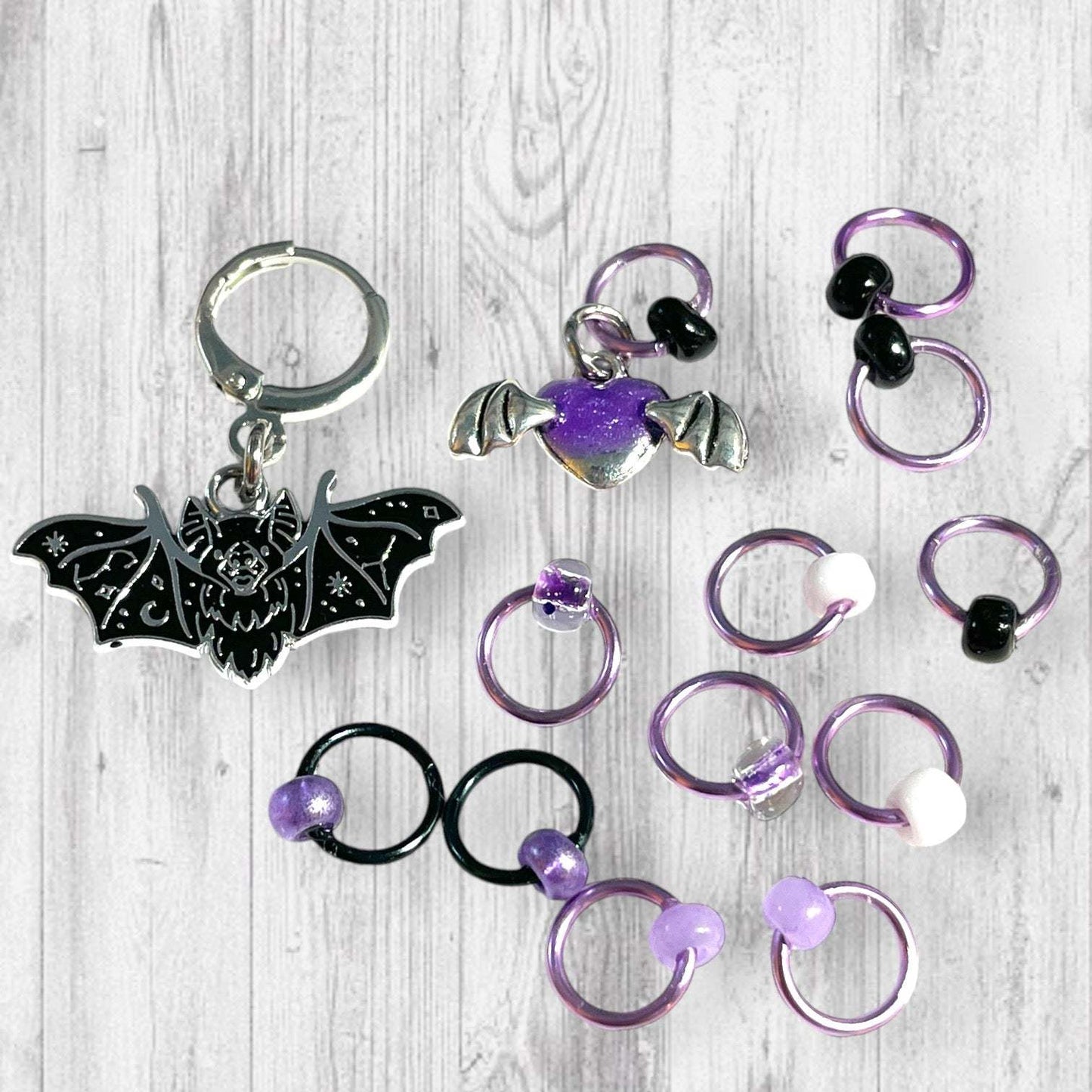 Playful Purple Bats Pass Piles of Peppermint Candy Progress and Stitch Markers