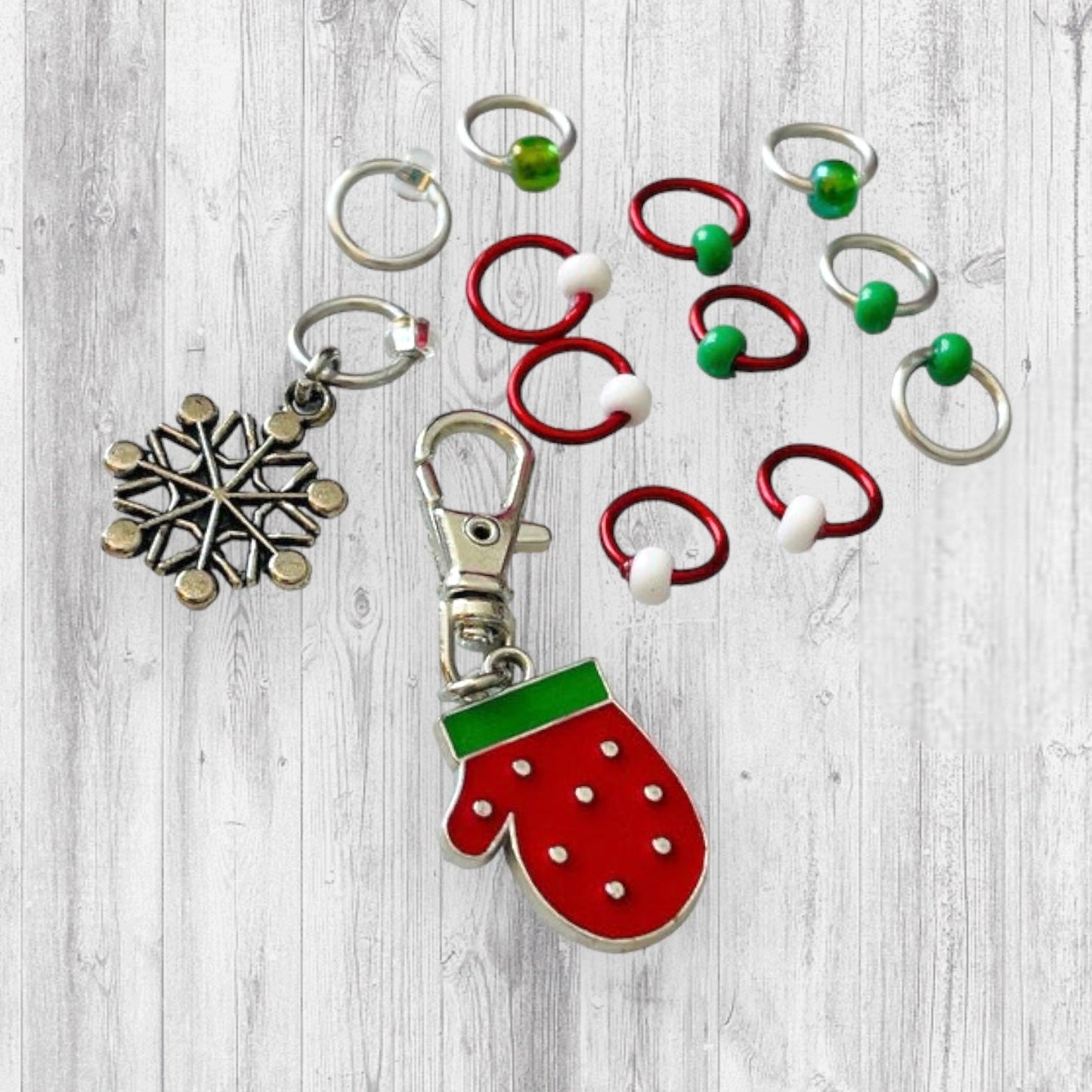 Red Mitten & Snowflake Progress and Stitch MarkersAdoreKnitRed Mitten &amp; Snowflake Progress and Stitch Marker Set. These stitch markers are great for a knitter or crocheter. Include in a swap package, teacher gift, or a lRed Mitten & Snowflake Progress