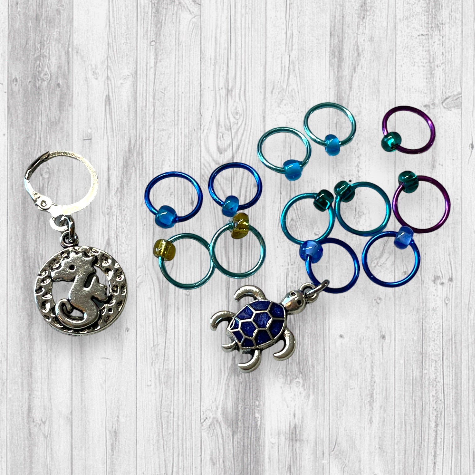 Seahorse and Blue Turtle Progress and Stitch MarkersAdoreKnitSeahorse and Blue Turtle Progress and Stitch Markers. The prefect gift for a knitter! These stitch markers are great for a knitter or crocheter. Include in a swap paBlue Turtle Progress