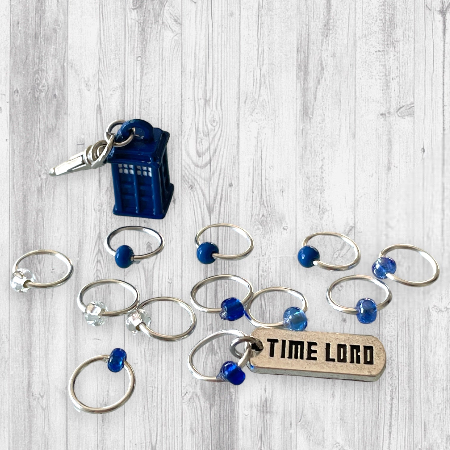 Something Blue Progress and Stitch MarkersAdoreKnitSomething Blue Progress and Stitch Marker Set.  Inspired by the Tardis and the Time Lord in the classic Science-Fiction show Doctor Who.  We all love Doctor Who arouBlue Progress