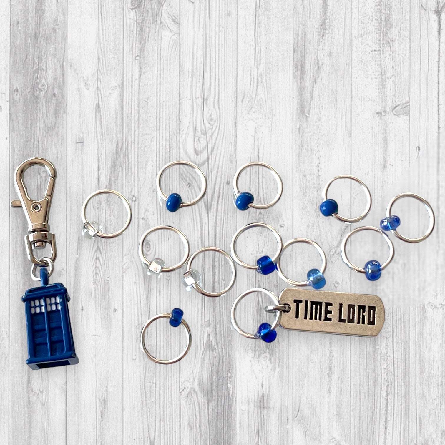 Something Blue Progress and Stitch MarkersAdoreKnitSomething Blue Progress and Stitch Marker Set.  Inspired by the Tardis and the Time Lord in the classic Science-Fiction show Doctor Who.  We all love Doctor Who arouBlue Progress